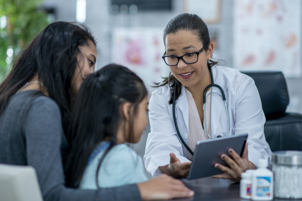 General pediatrician reviewing genetic testing options with a patient