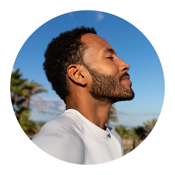 Man taking in fresh air outdoors
